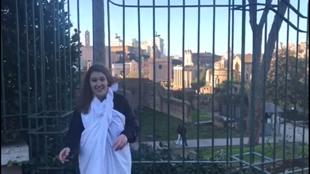 Maddie Allard in a toga in Rome