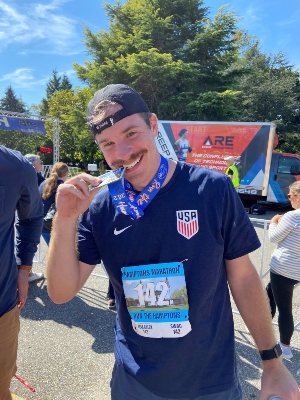 Tyler at the marathon finish line