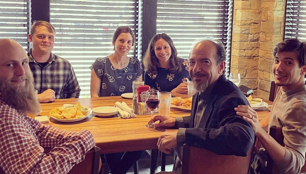 Ernie Suarez and graduate students at the Robert Penn Warren Circle