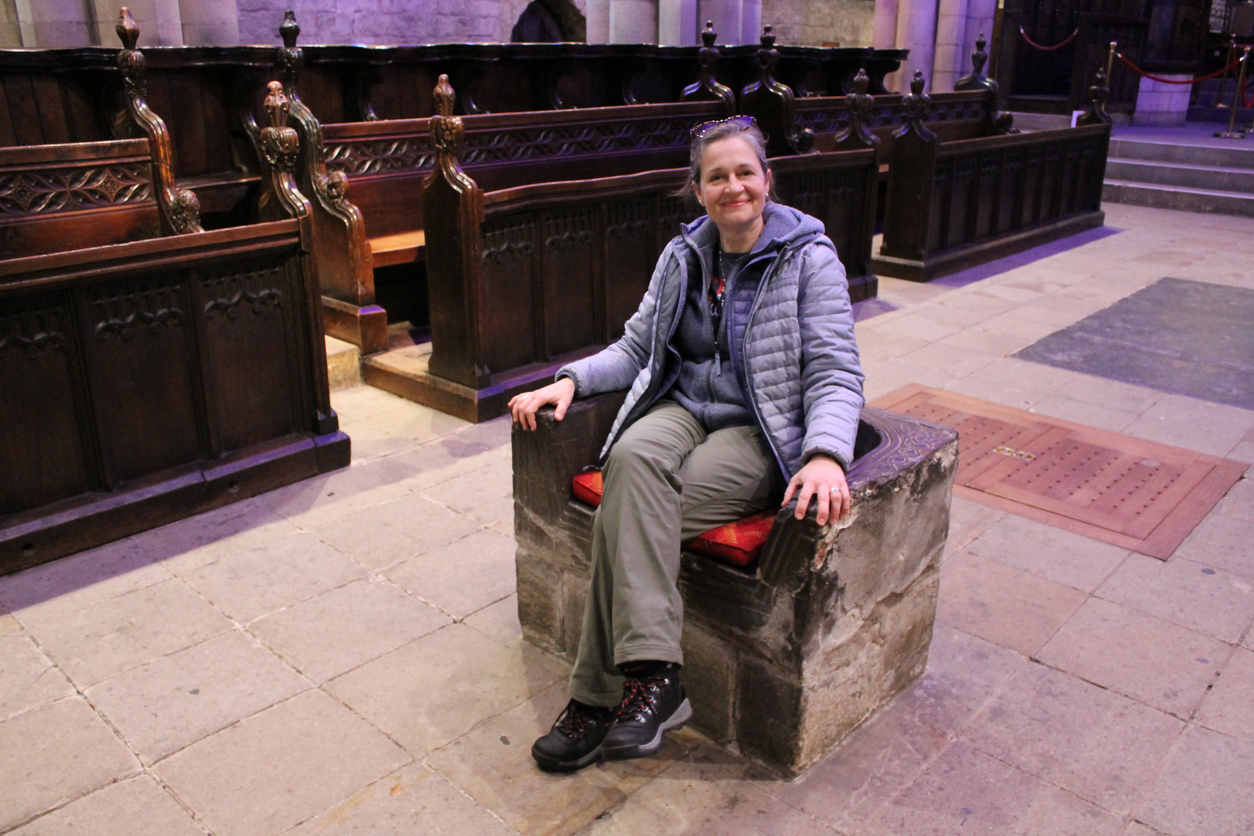 Dr. Kopar sitting on a firth stool